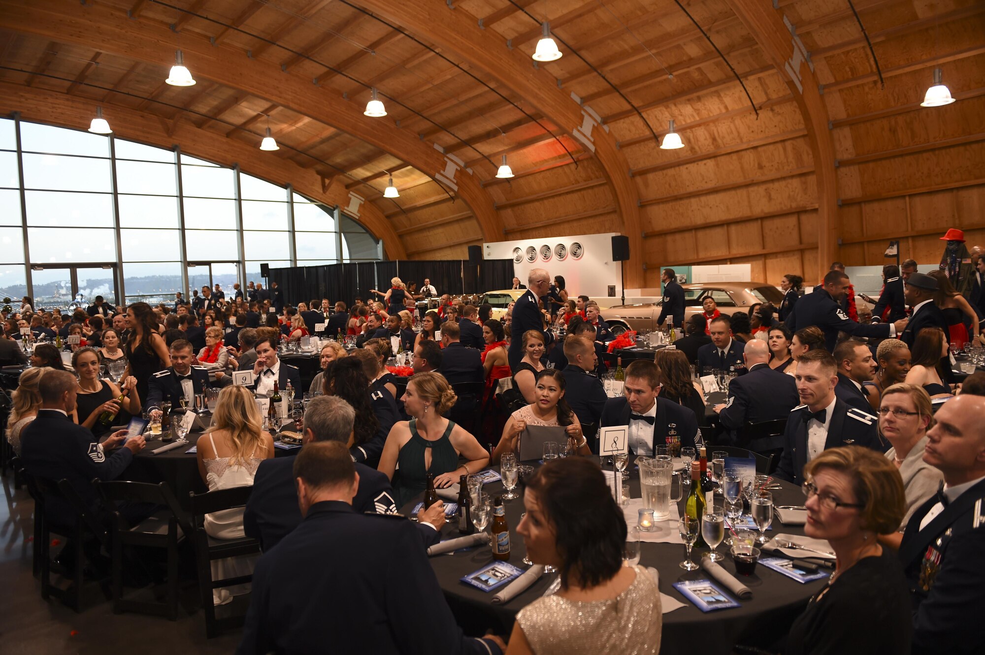 McChord Air Force Ball guests sit inside the Lemay America’s Car Museum in Tacoma, Wash., Sept. 23, 2016. Approximately 500 attendees recognized the history, celebrating the birthday of the United States Air Force in a time honored tradition, the Air Force Ball. (U.S. Air Force photo/Staff Sgt. Naomi Shipley)