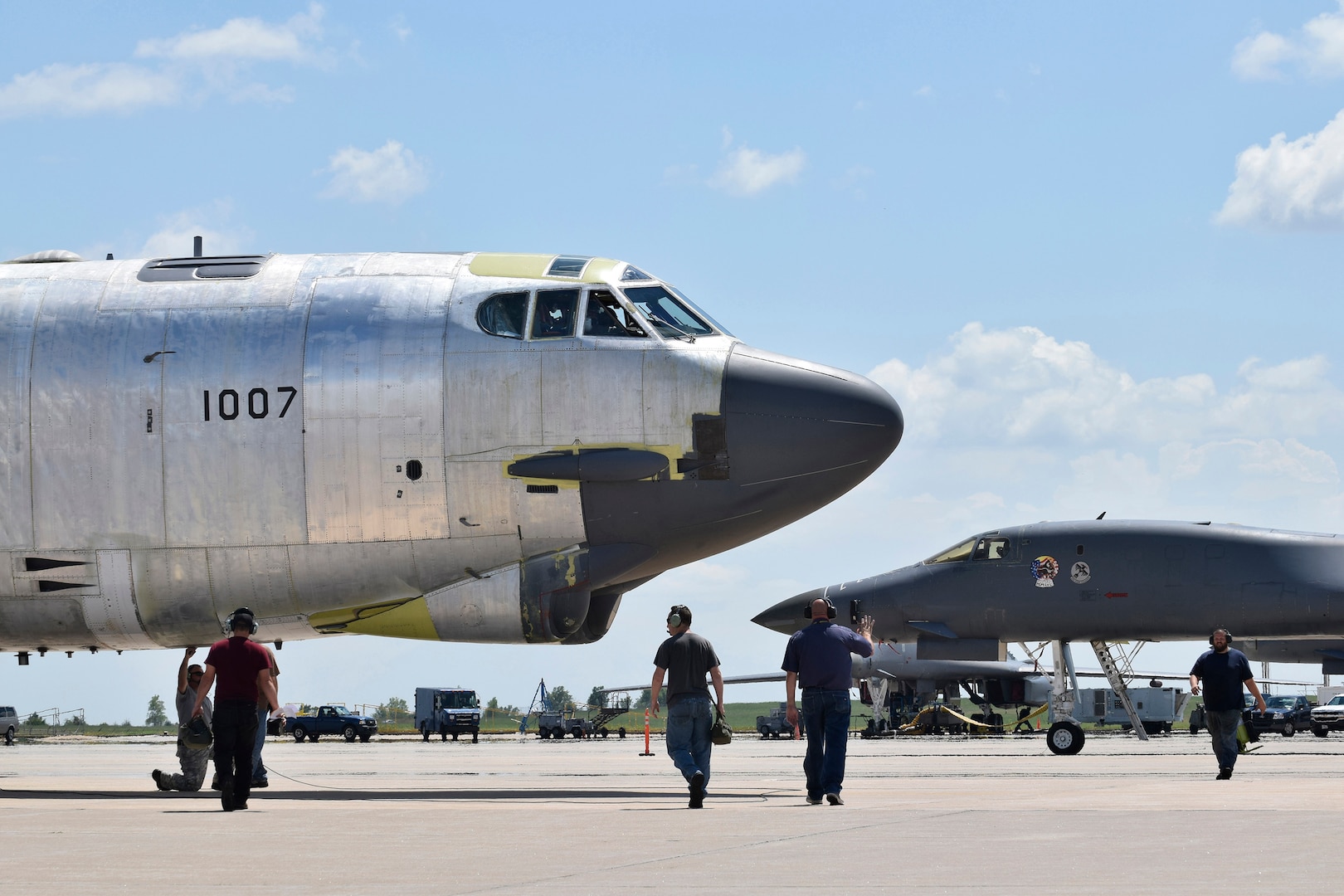 Maintenance personnel from the 565th Aircraft Maintenance Squadron work under and around B-52H 61-0007, 'Ghost Rider,' as the aircraft undergoes checks for an attempted functional test flight at the Oklahoma City Air Logistics Complex, Aug. 29, 2016, Tinker Air Force Base, Okla. 'Ghost Rider' is shown in natural metal as it completes a 19-month overhaul and upgrade to become the first B-52H to ever be regenerated from long-term storage with the 309th Aerospace Maintenance and Regeneration Group at Davis-Monthan AFB, Ariz., and returned to fully-operational flying status. (U.S. Air Force photo/Greg L. Davis)