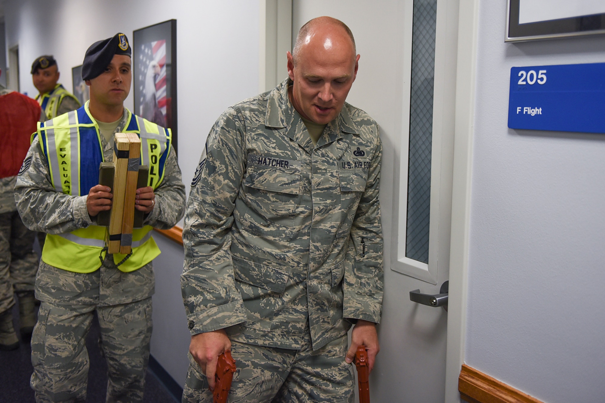PETERSON AIR FORCE BASE, Colo. – Master Sgt. Craig Hatcher, Vosler NCO Academy former director of operations, plays an assailant during an active-shooter exercise at the VNCOA on Peterson Air Force Base, Colo., Sept. 21, 2016. Hatcher attempted to enter a classroom looking for more “victims” during the exercise. (U.S. Air Force photo by Philip Carter)