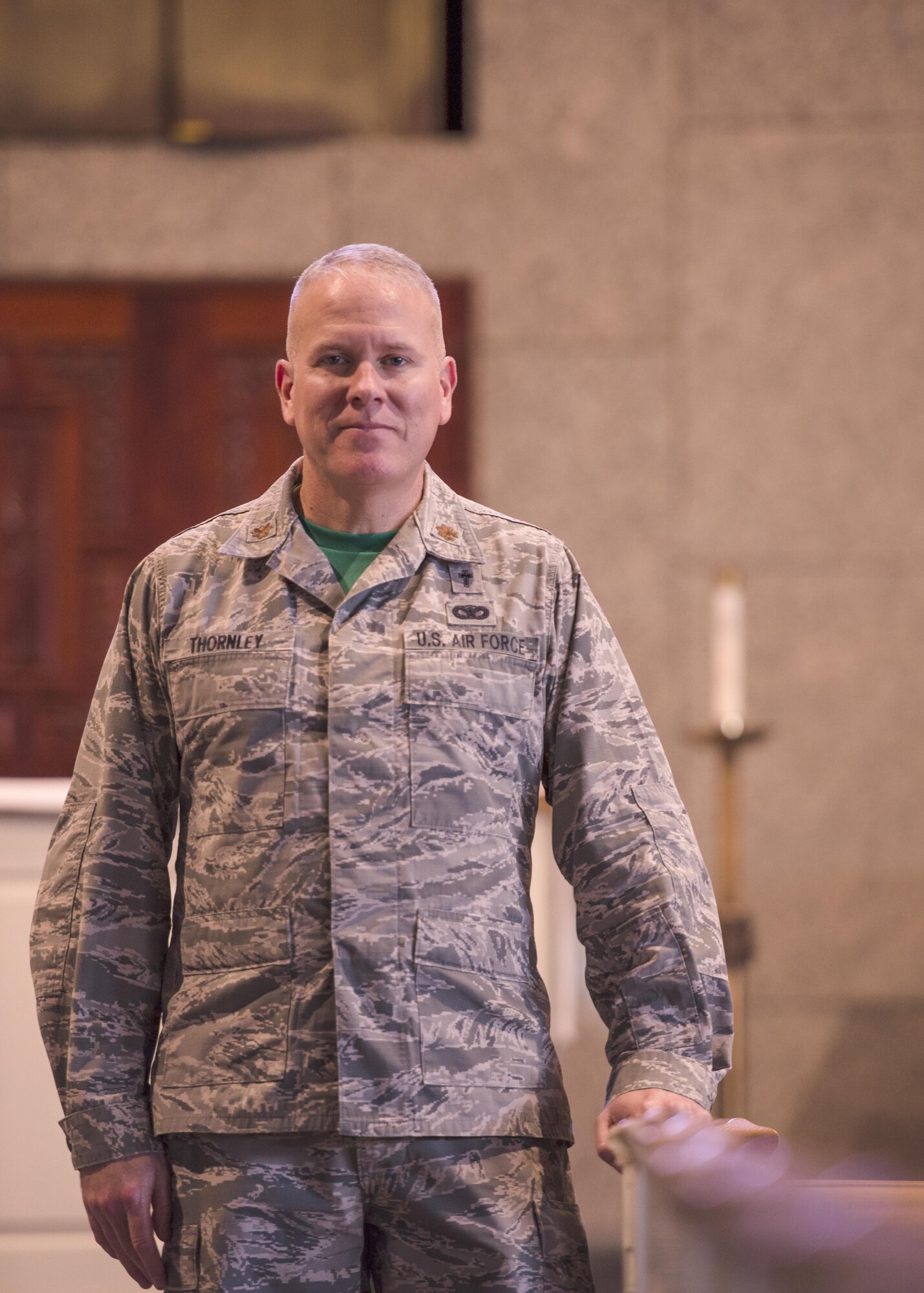 Major Andrew Thornley, 374th Wing Staff Angency wing chaplain poses for a photograph in the main chapel on Sept. 2, 2016 at Yokota Air Base, Japan. Maj. Thornley is the new wing chaplain for Yokota Air Base. (U.S. AIr Force photo by Airman 1st Class Donald Hudson/Released)
