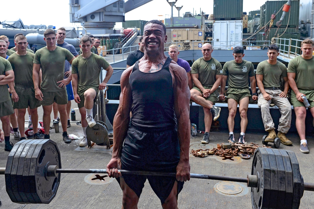 Navy Seaman Kennedy Prescott performs a deadlift during a powerlifting competition on the USS Whidbey Island in the Gulf of Oman, Sept. 18, 2016. The ship is supporting maritime security operations and theater security cooperation efforts in the U.S. 5th Fleet area of operations. Navy photo by Petty Officer 2nd Class Nathan R. McDonald