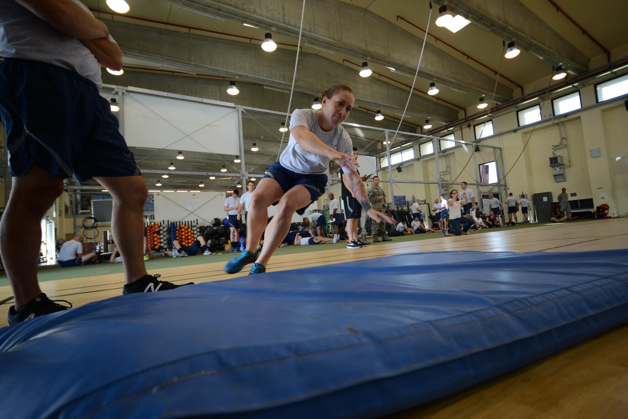 Senior Airman Bethany Zupkow, 31st Security Forces Squadron operations and support administrator, completes a sprint test during the German Armed Forces Proficiency Badge competition at Aviano Air Base, Italy on Sept. 19, 2016. Airmen competed in several basic fitness and marksmanship tests. (U.S. Air Force photo by Staff Sgt. Andrew M. Satran/Released)