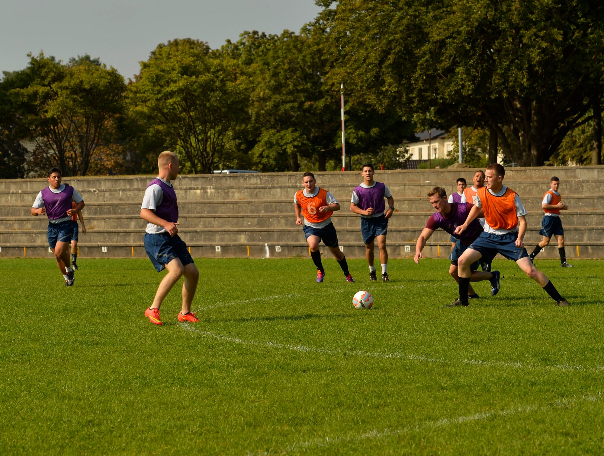 Airmen assigned to the 86th Airlift Wing compete in a soccer game during the 2016 Commander’s Challenge at Ramstein Air Base, Germany, Sept. 23, 2016. The Commander’s Challenge consisted of 15 sporting events that were intended to promote physical fitness and camaraderie. The events included soccer, basketball, flag football, dodgeball, and tug-of-war among other sports. (U.S. Air Force photo by Airman 1st Class Joshua Magbanua)