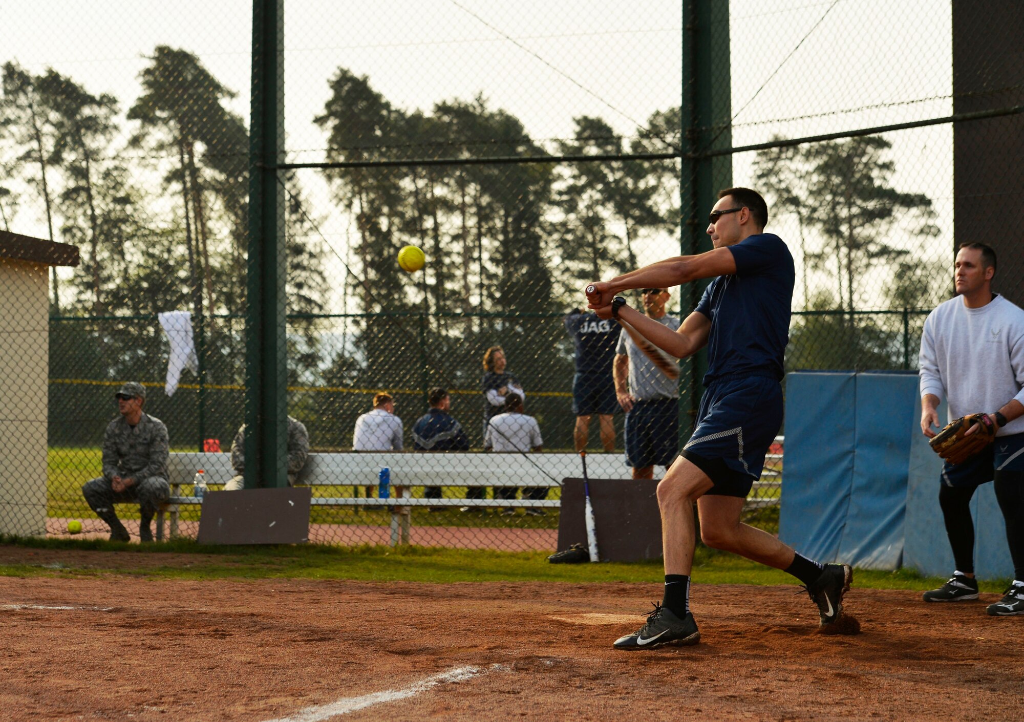 Airmen assigned to the 86th Airlift Wing participate in a softball game during the 2016 Commander’s Challenge at Ramstein Air Base, Germany, Sept. 23, 2016. All 86th AW units were invited to attend the Commander’s Challenge, which consisted of 15 sporting events. The event was part of the wing’s resiliency day, and emphasized the physical domain of the Comprehensive Airman Fitness Model. (U.S. Air Force photo by Airman 1st Class Joshua Magbanua)