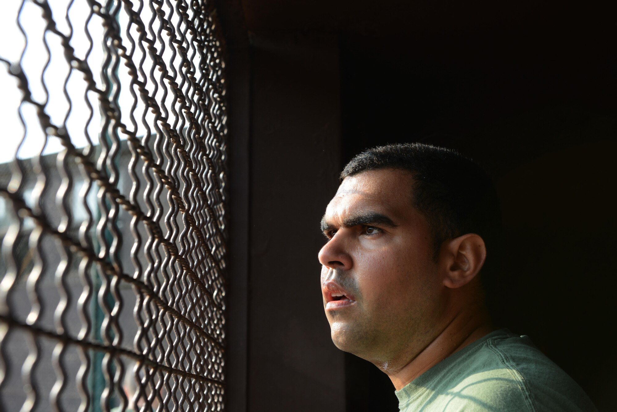 Staff Sgt. Bernardo Cortes, 86th Security Forces Squadron military working dog trainer, watches his team play softball during the 2016 Commander’s Challenge, at Ramstein Air Base, Germany, Sept. 23 2016. Units around the 86th Airlift Wing formed teams to participate in 15 different sporting events throughout the day. The Commander’s Challenge emphasized the physical domain of Comprehensive Airman Fitness. (U.S. Air Force photo by Airman 1st Class Joshua Magbanua)