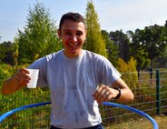 Senior Airman Dustin Dixon, 37th Airlift Squadron loadmaster, hula hoops during the Commander's Challenge Sept. 23, 2016 at Ramstein Air Base, Germany. The Commander's Challenge is part of the wing's Resilience Day and included numerous sports competitions and a barbecue. (U.S. Air Force photo by Staff Sgt. Sharida Jackson)