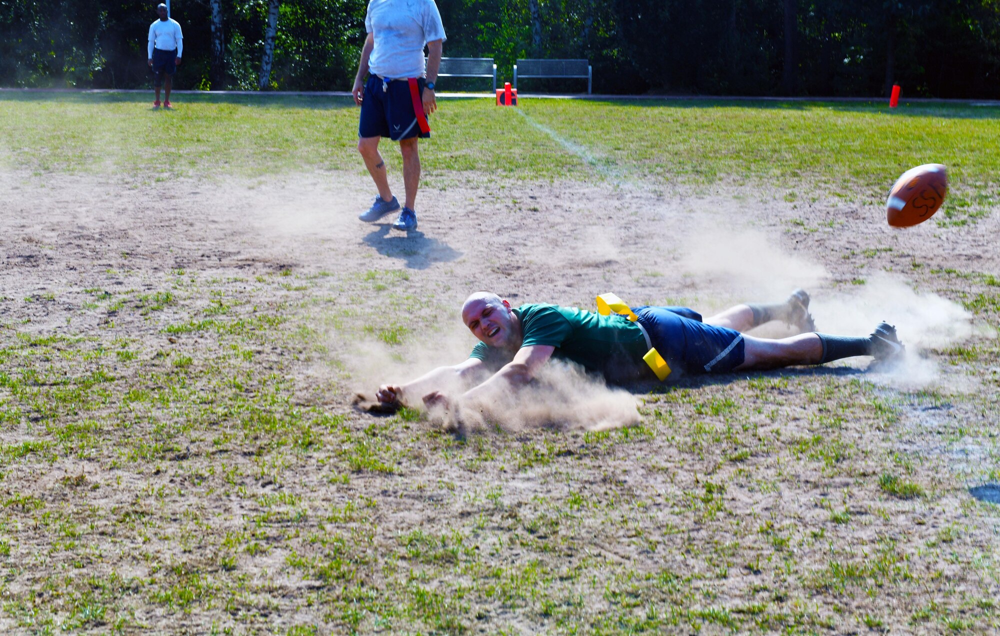 Staff Sgt. Andrew Taylor, 86th Logistics Readiness Squadron fuels distribution supervisor, dives for the football during the Commander’s Challenge Sept. 23, 2016, at Ramstein Air Base, Germany. The Commander’s Challenge was part of the 86th Airlift Wing’s Resilience Day and also included basketball, soccer, tug-of-war, softball, volleyball, and hula hoop events. (U.S. Air Force photo by Staff Sgt. Sharida Jackson)