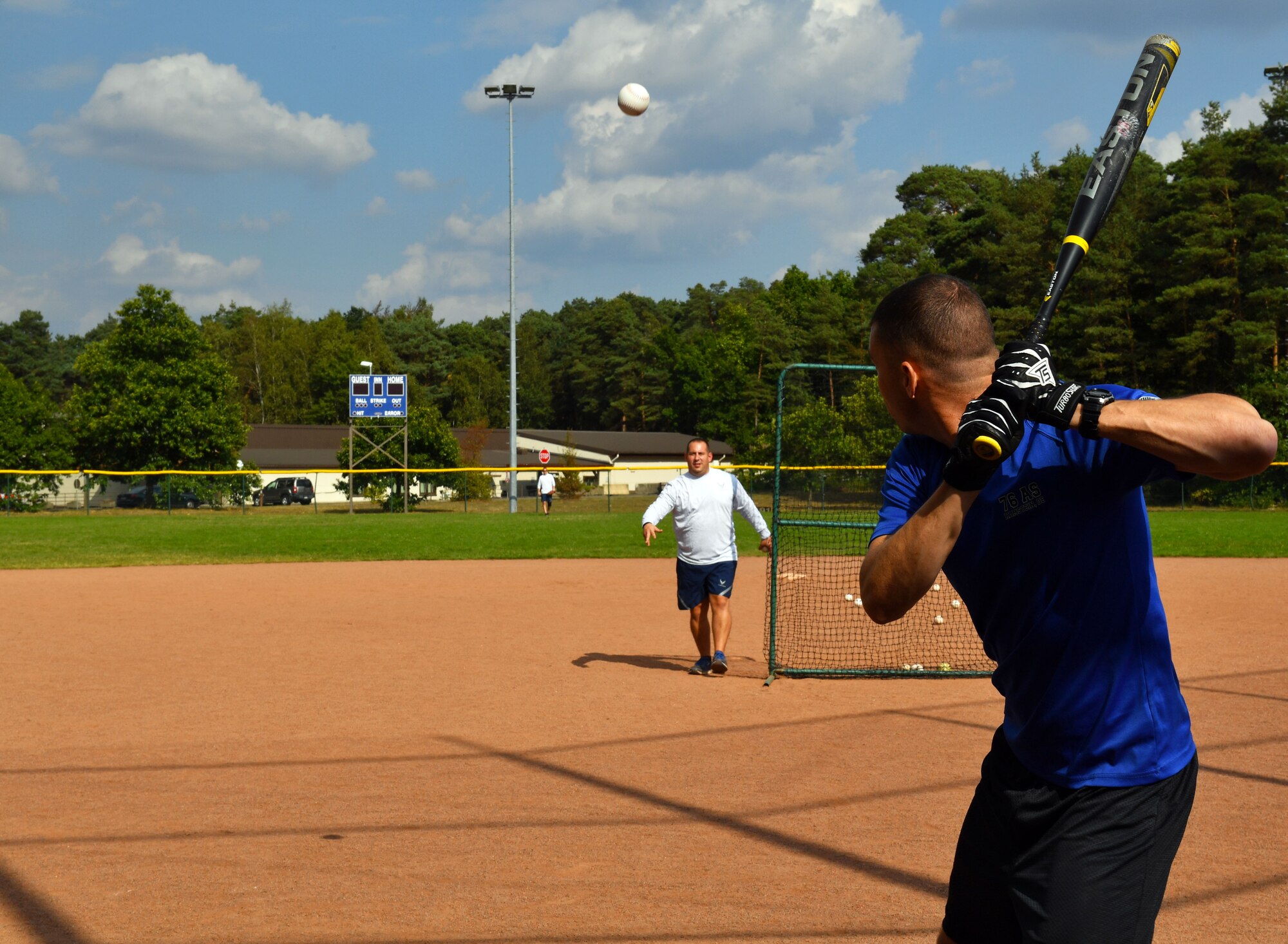 Capt. Greg Ihlenberg, 76th Airlift Squadron C-21 evaluator pilot, participates in the home run derby during the Commander’s Challenge Sept. 23, 2016, at Ramstein Air Base, Germany. The Commander’s Challenge also included basketball, softball, kickball, dodgeball, football, soccer, and volleyball tournaments. (U.S. Air Force photo by Staff Sgt. Sharida Jackson)