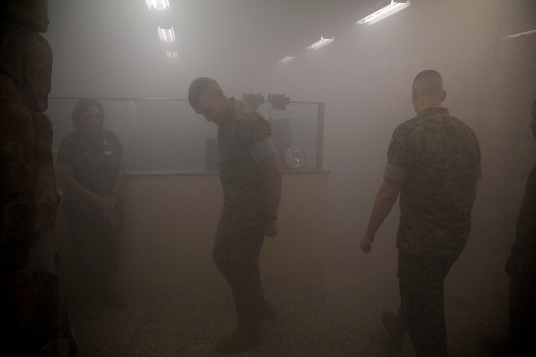 BGEN Bohm, Commanding Officer, Training Command, gets a demonstration of the simulation lab while touring Field Medical Training Battalion-East.