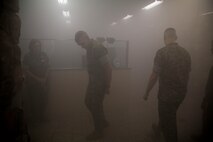 BGEN Bohm, Commanding Officer, Training Command, gets a demonstration of the simulation lab while touring Field Medical Training Battalion-East.