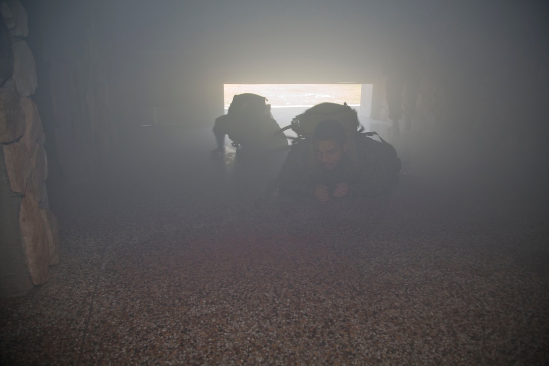Two students demonstrate entry into the FMTB-E simulation lab.