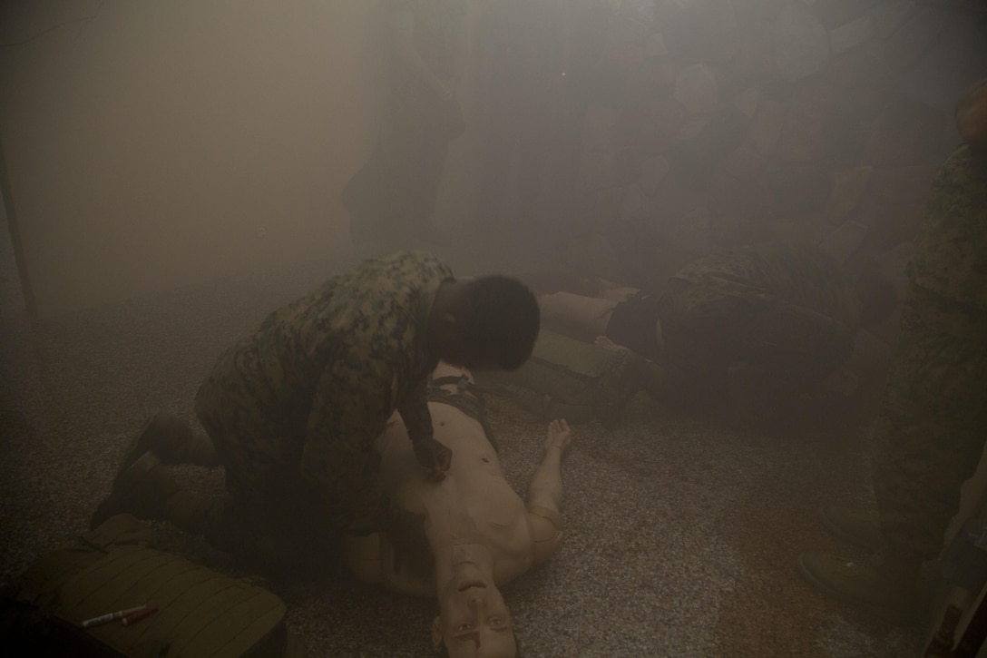 Students demonstrate combat care procedures in the FMTB-E simulation Lab.