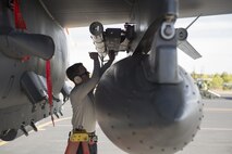 U.S. Air Force Airman 1st Class Andrew Smith, 48th Aircraft Maintenance Squadron aircraft armament system technician, removes impulse cartridges to facilitate scheduled maintenance in support of Tactical Leadership Programme 16-3 at Los Llanos Air Base, Spain Sept. 19.  The training prepares NATO and allied forces’ flight leaders to serve as mission commanders, lead coalition force air strike packages, and provide tactical air expertise to NATO agencies. (U.S. Air Force photo/ Staff Sgt. Emerson Nuñez)