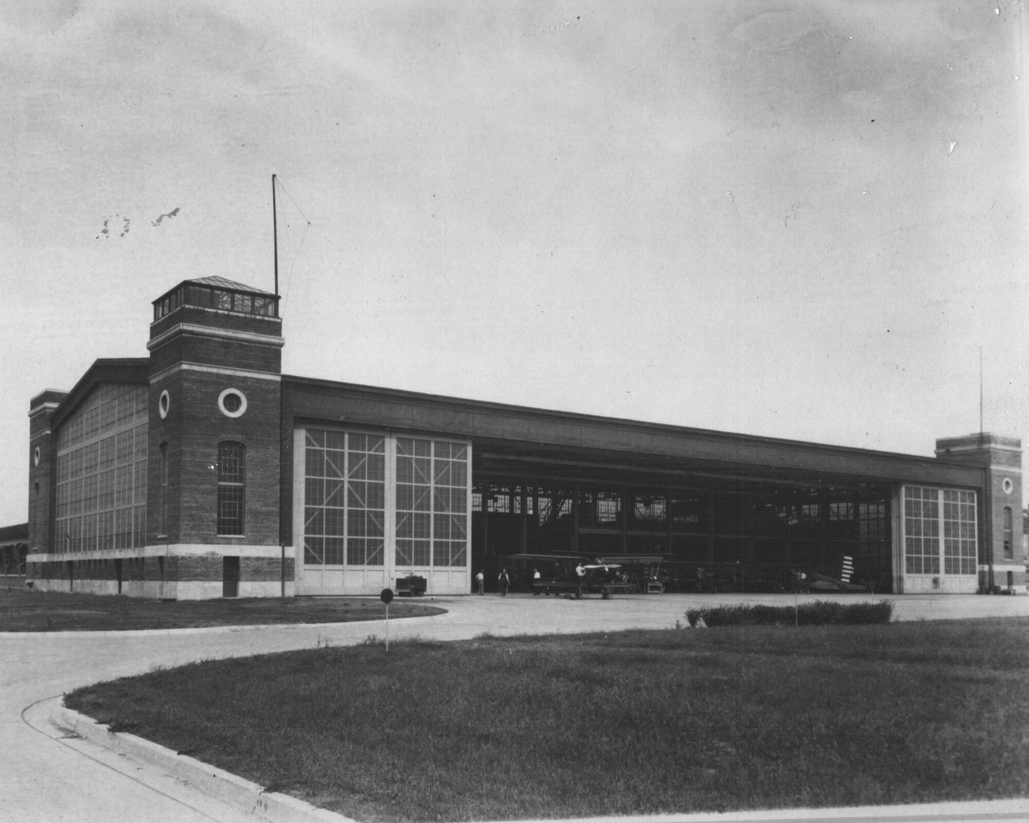 1930s photo of Bldg 31 before it was converted to landing gear test facility; the 1st control tower for wright field can be seen in the upper left. (U.S. Air Force photo)
