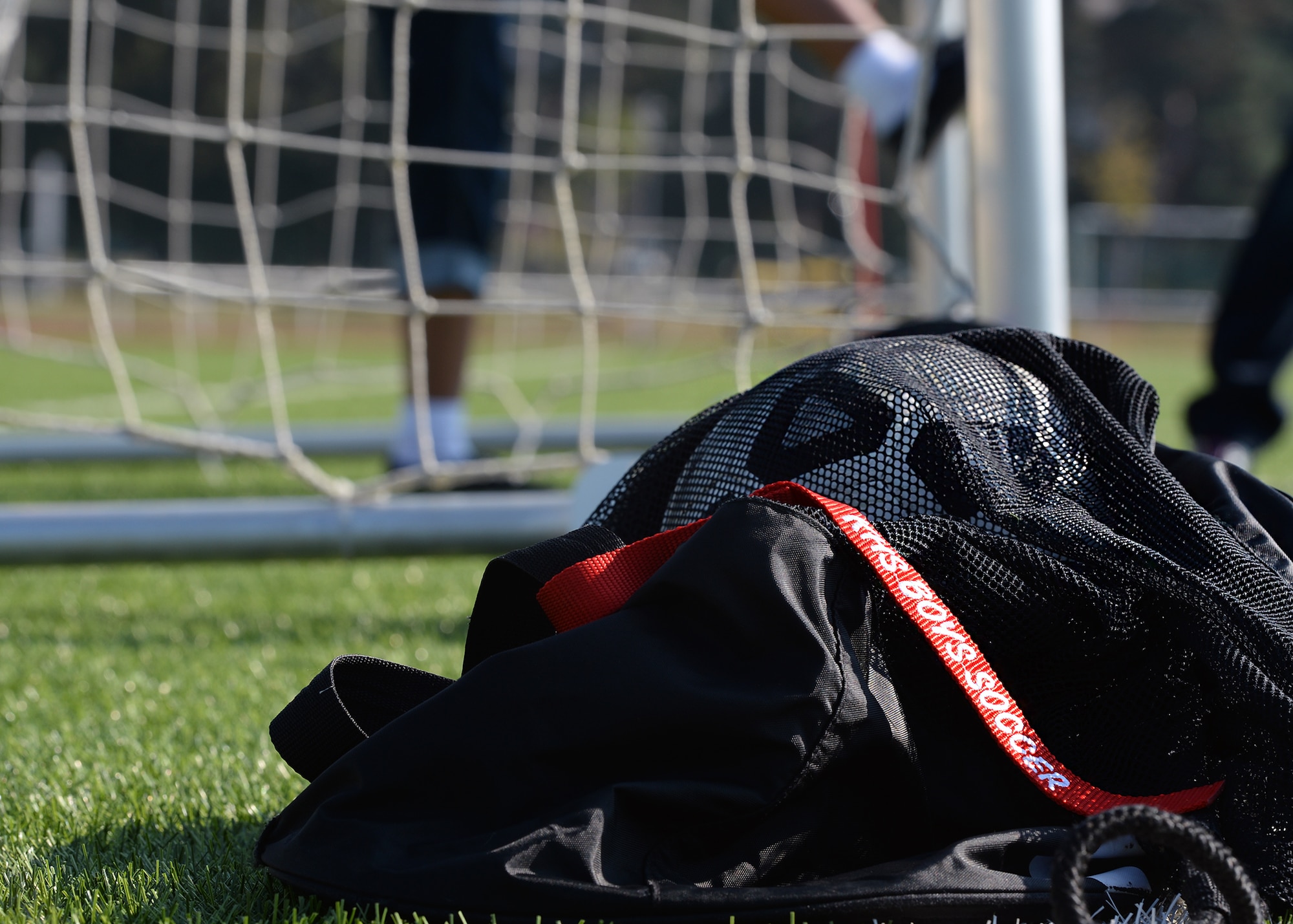 A soccer ball lays next to a goal at Kaiserslautern High School on Vogelweh Military Complex, Germany, Sept. 22, 2016. The high school hosted an adaptive sports soccer game put on by the Kaiserslautern Military Community 1st Four for kids with disabilities. (U.S. Air Force photo by Senior Airman Jimmie D. Pike)