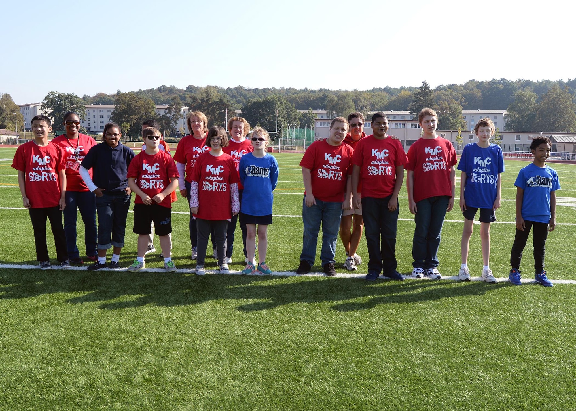 Children from Kaiserslautern and Ramstein Middle Schools pose for a photo before an adaptive sports soccer game at Kaiserslautern High School on Vogelweh Military Complex, Germany, Sept. 22, 2016. Adaptive sports provides children with disabilities the opportunity to socialize and have fun with their peers. (U.S. Air Force photo by Jimmie D. Pike)