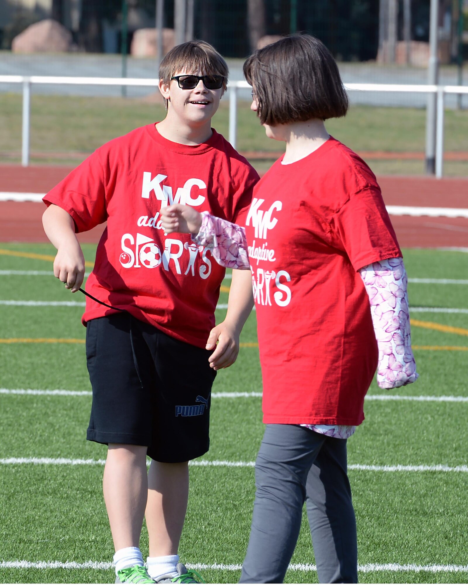 James Lucas and Erin Fairchild, both Kaiserslautern Middle School students, celebrate after the KMS team scored a goal during an adaptive sports soccer game at Vogelweh Military Complex, Germany, Sept. 22, 2016. The adaptive sports program is currently run by the KMC 1st Four, and operates other programs such as softball in the spring and soccer in the fall (U.S. Air Force photo by Senior Airman Jimmie D. Pike)