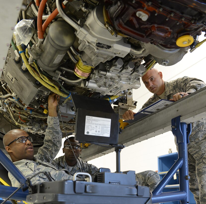 U.S. Air Force Staff Sgt. Augustus Joseph, 192nd Maintenance Squadron crash and recovery team member, inspects the core of an engine using a flexible borescope while U.S. Air Force Tech. Sgts. Brian Price, 1st Maintenance Group maintenance training instructor, and Riyyad Schools, 1st Maintenance Squadron jet engine intermediate maintenance NCO in charge, observe his technique at Joint Base Langley-Eustis, Va., Sept. 12, 2016. Maintenance training instructors are responsible for training 2,000 students annually. (U.S. Air Force photo by Staff Sgt. Teresa J. Cleveland)