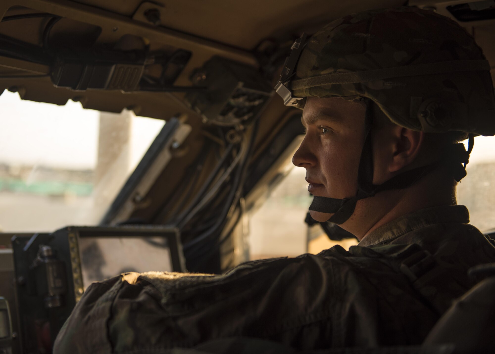 Senior Airman Michael Van Deusen, 455th Expeditionary Security Forces Squadron quick reaction force, patrols the flightline in a mine-resistant ambush-protected (MRAP) vehicle, Bagram Airfield, Afghanistan, Sept. 27, 2016. MRAPs are equipped with an independent suspension system to combat rocky terrain, mountainous off-rod environments, and dispersed combat operations. (U.S. Air Force photo by Senior Airman Justyn M. Freeman)
