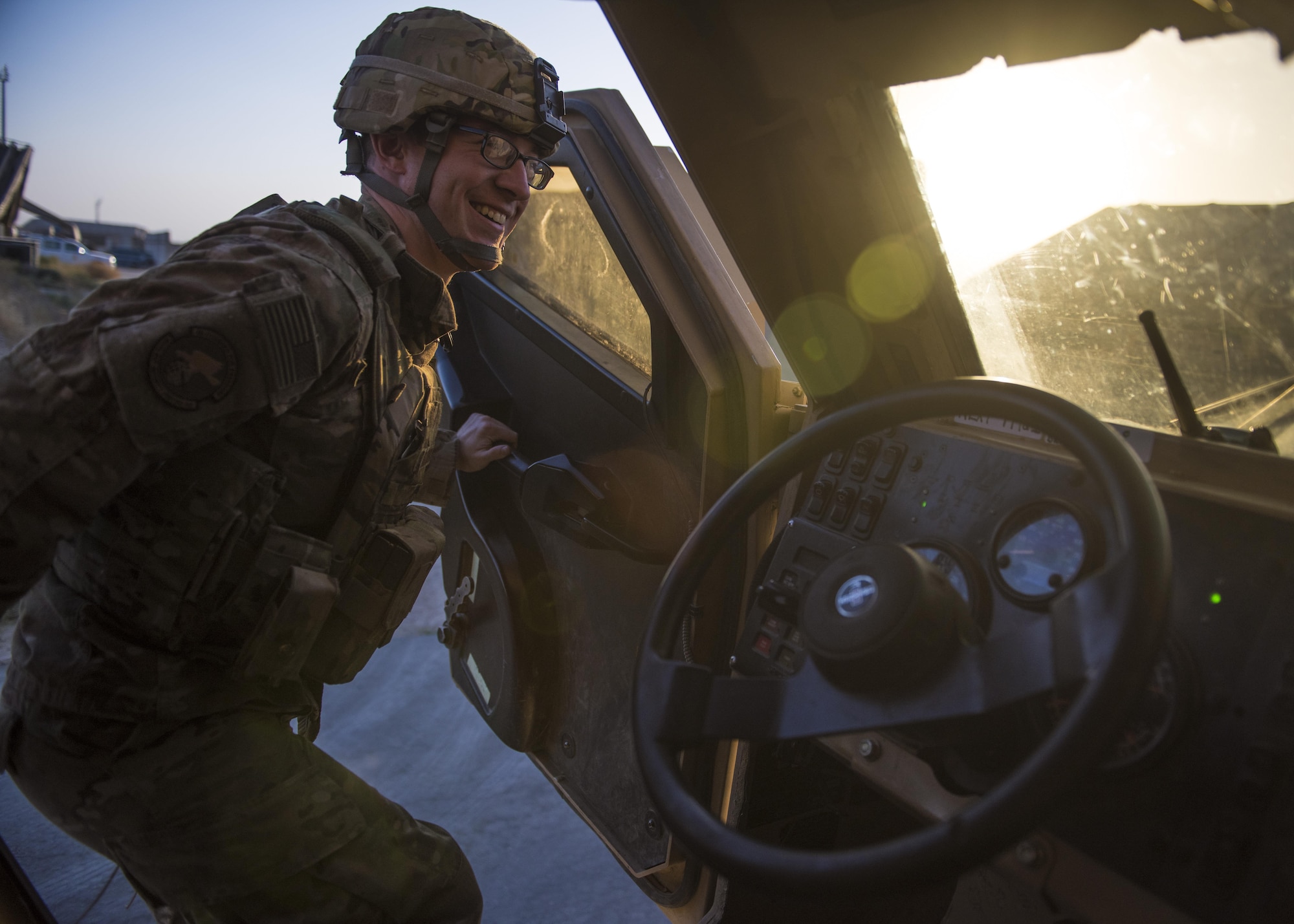 Senior Airman Jay Prather, 455th Expeditionary Security Forces Squadron quick reaction force, gets into a mine-resistant ambush-protected (MRAP) vehicle, Bagram Airfield, Afghanistan, Sept. 27, 2016. MRAPs are one of the many vehicles that help the 455th ESFS conduct their patrols to keep flightline secure. (U.S. Air Force photo by Senior Airman Justyn M. Freeman)