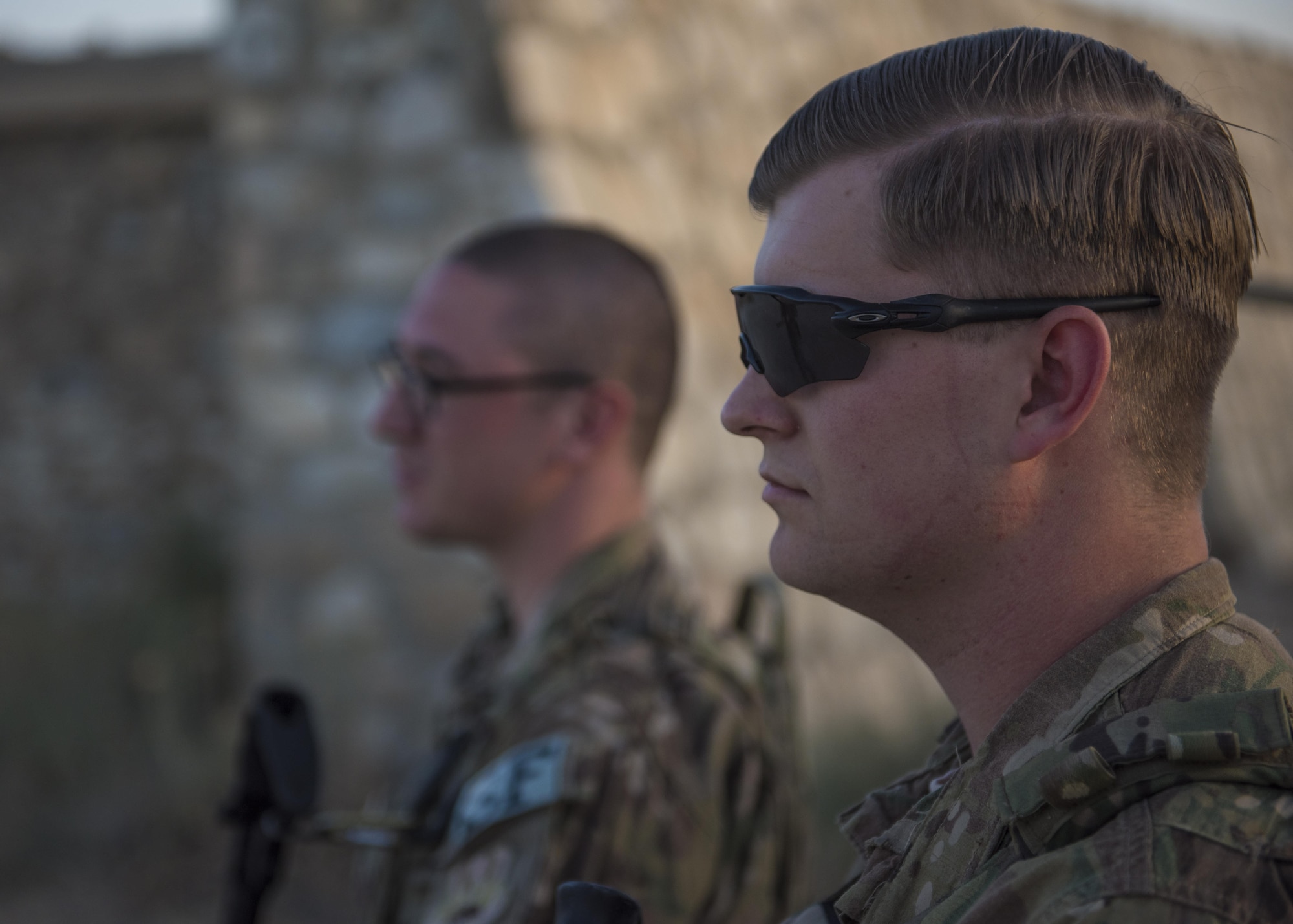 Senior Airman Michael Van Deusen (right) and Senior Airman Jay Prather (left), 455th Expeditionary Security Forces Squadron quick reaction force, patrol the flightline, Bagram Airfield, Afghanistan, Sept. 27, 2016. Members of the 455th ESFS QRF teams check buildings and other areas on the flightline in order to deter threats. (U.S. Air Force photo by Senior Airman Justyn M. Freeman)