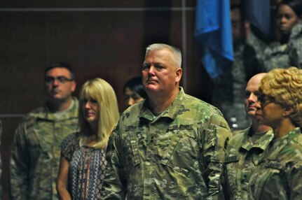 Maj. Gen. Nick Tooliatos (center), commanding general, 63rd Regional Support Command, Brig. Gen. Doug Anderson (second right), deputy commanding general, 63rd RSC and Chief Warrant Officer 5 Belynda Lyndsey (right), command chief warrant officer, 63rd RSC, pay solemn tribute to the fallen during a rendition of ‘Taps’ at the conclusion of the 63rd RSC’s 4th annual Gold Star Family Day event, Sept. 24, Armed Forces Reserve Center, Mountain View, Calif. (U.S. Army Reserve photo by Capt. Alun Thomas)