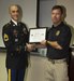 Sergeant Steven W. Downey, desk sergeant with the Marine Corps Police Department, presented his supervisor, Lt. Justin C. Witcher the Service Member Patriot Award during a ceremony held aboard Marine Corps Logistics Base Barstow, Calif., Sept. 16.