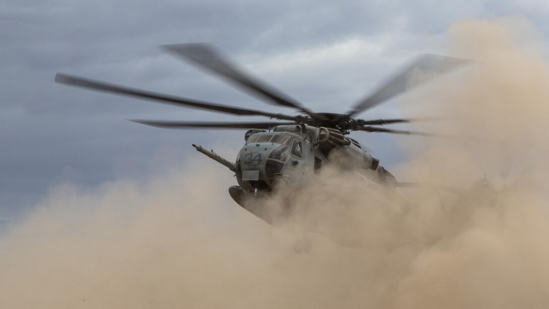 A CH-53E Super Stallion assigned to Marine Aviation Weapons and Tactics Squadron One lands during Weapons and Tactics Instructor Course 1-17 at Yuma Proving Ground, Ariz., Sept. 27, 2016. This exercise was part of WTI 1-17, a seven week training event, hosted by Marine Aviation Weapons and Tactics Squadron One cadre, which emphasizes operational integration of the six functions of Marine Corps aviation in support of a Marine Air Ground Task Force. MAWTS-1 provides standardized advanced tactical training and certification of unit instructor qualifications to support Marine Aviation Training and Readiness and assists in developing and employing aviation weapons and tactics. 