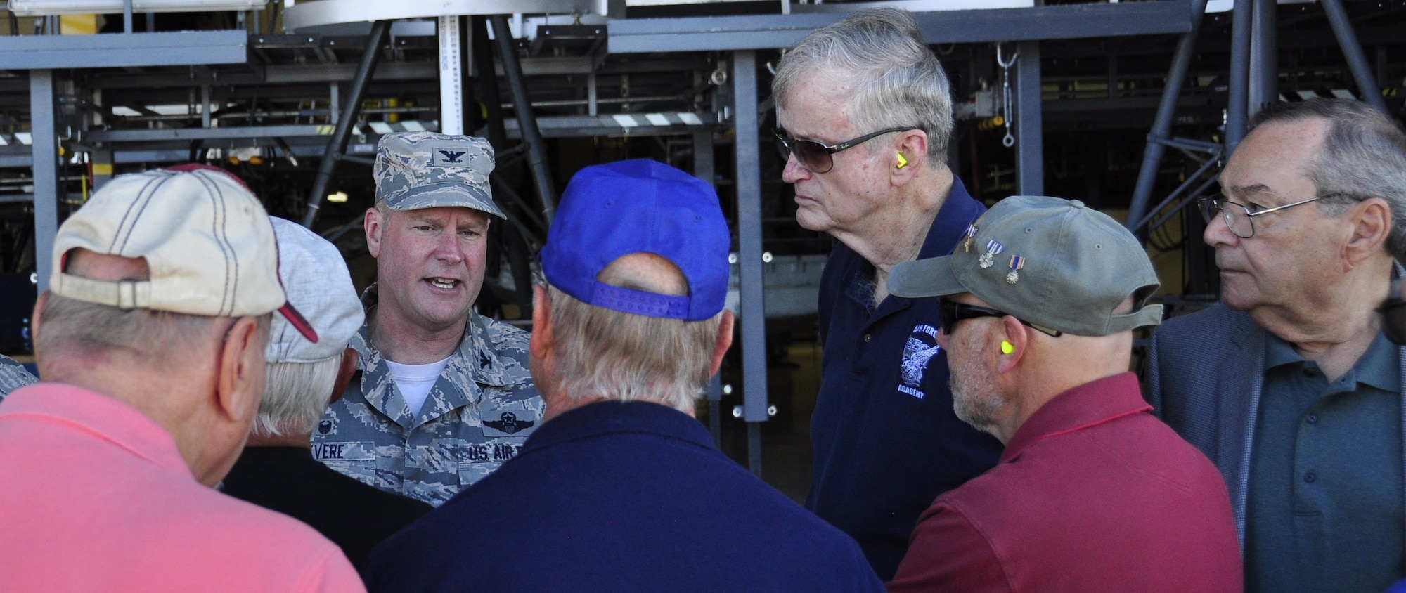 PETERSON AIR FORCE BASE, Colo. – Col. James DeVere, 302nd Airlift Wing commander, greets visiting Veterans who flew C-130 tactical airlift missions during the Vietnam War, here. The group of nearly twenty  toured the Reserve Wing and a C-130H3, Sept. 22, 2016, the day after a C-130 tactical airlift mission memorial plaque was unveiled at the U.S. Air Force Academy's Southeast Asia Plaza of Heroes. The plaza honors the academy's Vietnam Veterans and the new memorial plaque was dedicated to the C-130 aircrews' contributions during the war. 
(U.S. Air Force photo/Daniel Butterfield)
