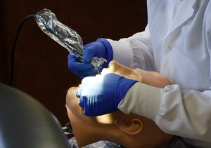Jennifer Pulley, a dental hygienist student at Trident Technical College, practices dental cleaning on a simulated patient during class at Charleston, South Carolina, Sept. 13, 2016. The students are civilian and active-duty service members training to become board certified dental hygienists. The cooperative dental program consists of an 18-24 month curriculum. 