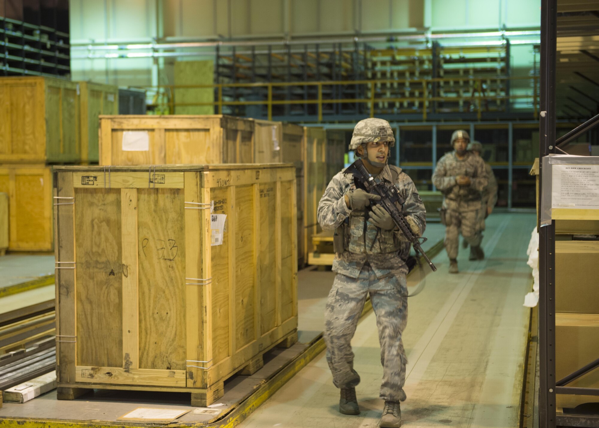 U.S. Air Force Staff Sgt. Michael Galindo, 48th Security Forces Squadron electronic security systems noncommissioned officer in-charge, searches a building during an active shooter exercise at Royal Air Force Lakenheath, England, Sept. 22. Defenders were evaluated on their ability to handle the situation in an unfamiliar environment. (U.S. Air Force photo/Senior Airman Malcolm Mayfield)