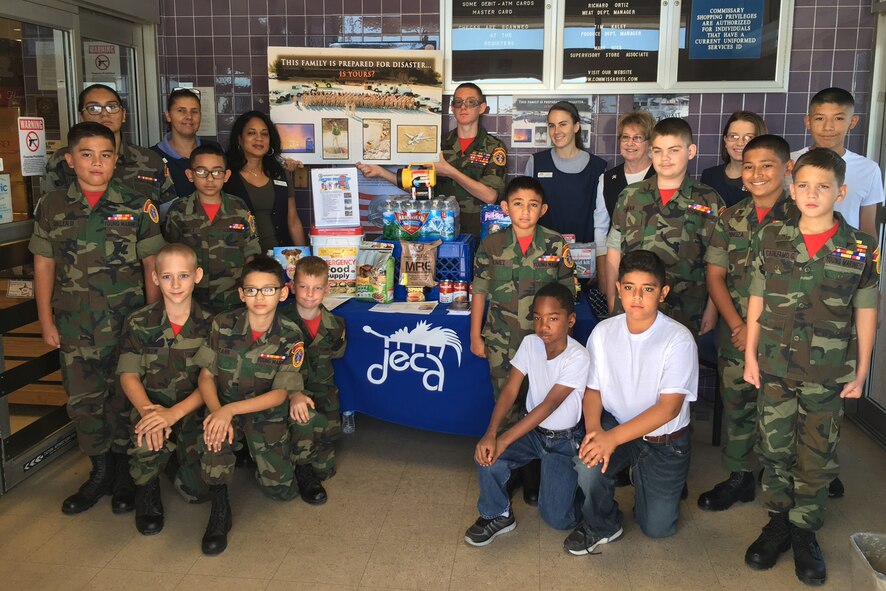 Defense Commissary Agency commissary staff and Yuma Young Marines support the National Preparedness Month campaign at Marine Corps Air Station Yuma, Ariz.