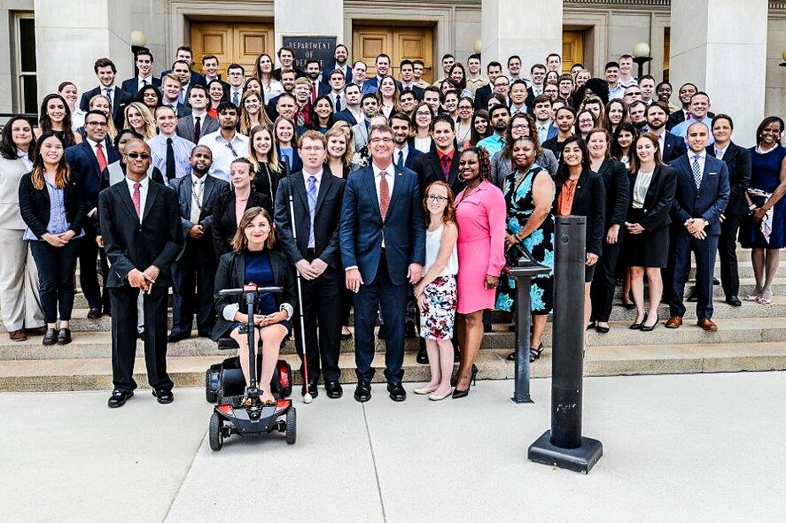 Defense Secretary Ash Carter takes a photograph with summer interns including those participating in the Workforce Recruitment Program at the Pentagon.