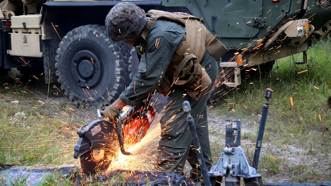 A Marine salvages an aircraft rotor during a field exercise at Marine Corps Outlying Field Camp Davis, N.C., Sept. 22, 2016. Support squadrons across the Marine Corps often conduct these exercises to remain ready for any challenge they may face in forward depoloyed environments. This exercise featured events such as auxiliary airfield construction, ground security and airfield damage repair. The squadron's capabilities contribute to 2nd Marine Aircraft Wing's role in the Marine Air Ground Task Force's mission accomplishment. This exercisewas conducted by Marine Wing Support Squadron 274, Marine Aircraft Group 29, 2nd MAW.