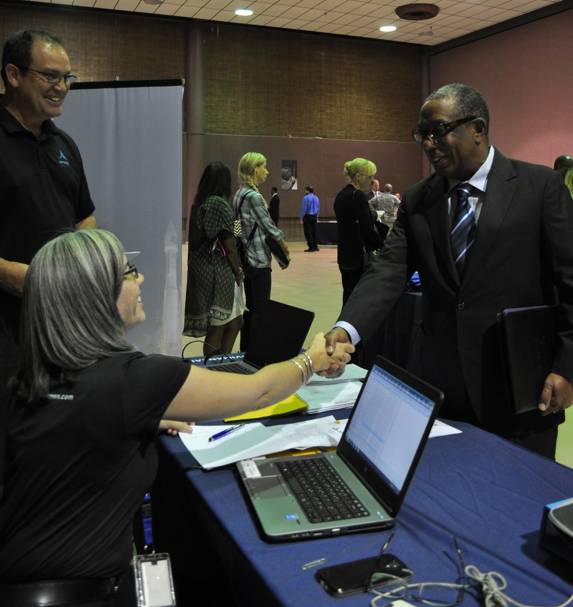 David Stuart, job applicant, completes an on-the-spot interview a Air Force Global Strike Command’s Nuclear Command, Control and Communications job fair. Many applicants received tentative job offers before leaving. Approximately 647 people attended the event. (U.S. Air Force photo/Joe Thomas)