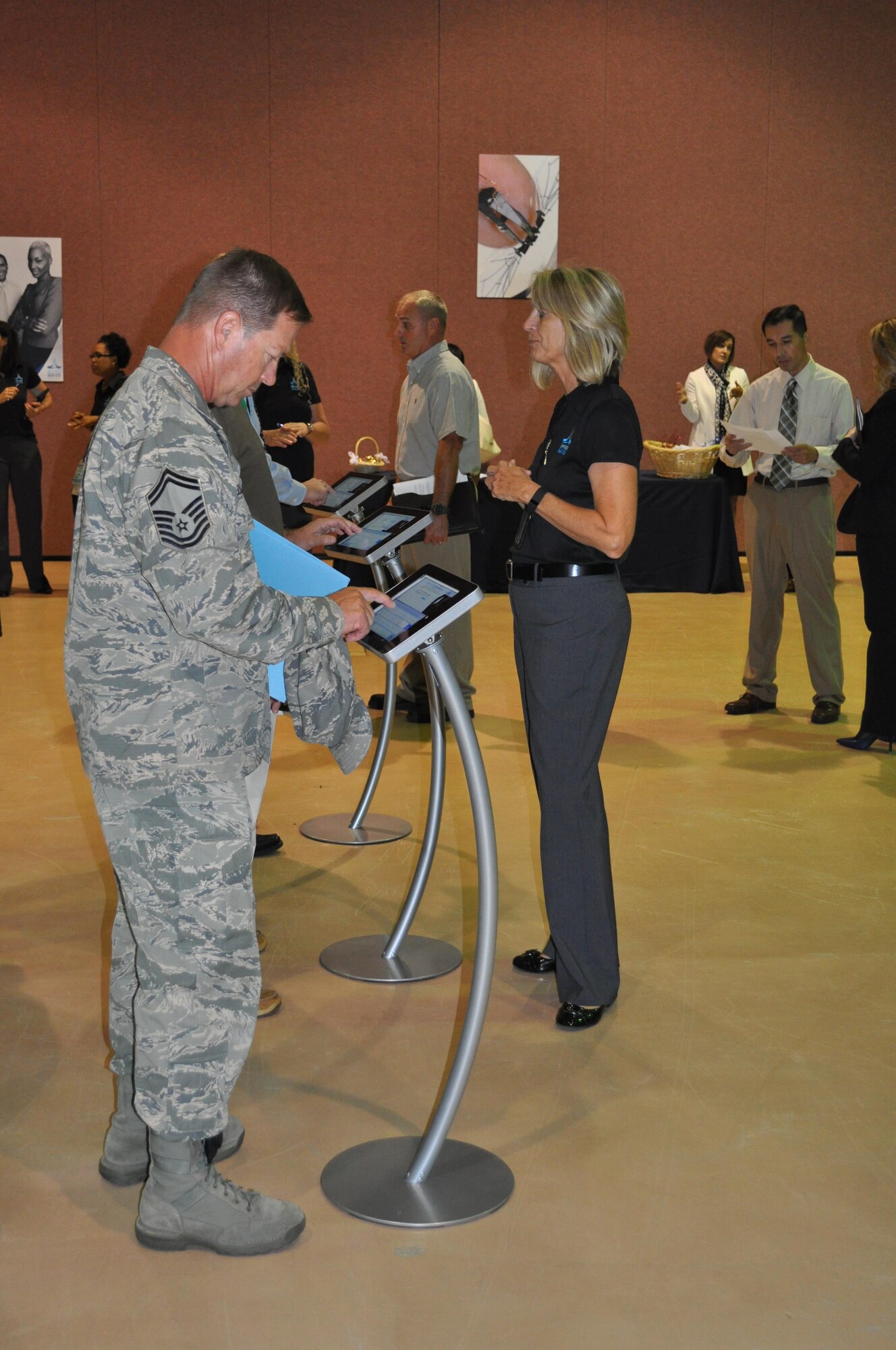 Applicants register at an Air Force Global Strike Command’s Nuclear Command, Control and Communications job fair using Air Force Personnel Center’s portable Recruitment Opportunity Activity System. The command hired for career fields ranging from cybersecurity to budget analysis. (U.S. Air Force photo/Joe Thomas)