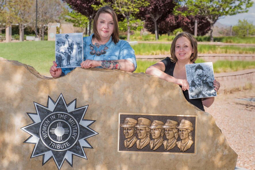 Veterans Lindsey Kibler and Gabrielle Holcomb hold photographs from their service in the Army at the New Mexico Veterans’ Memorial Park in Albuquerque, N.M.