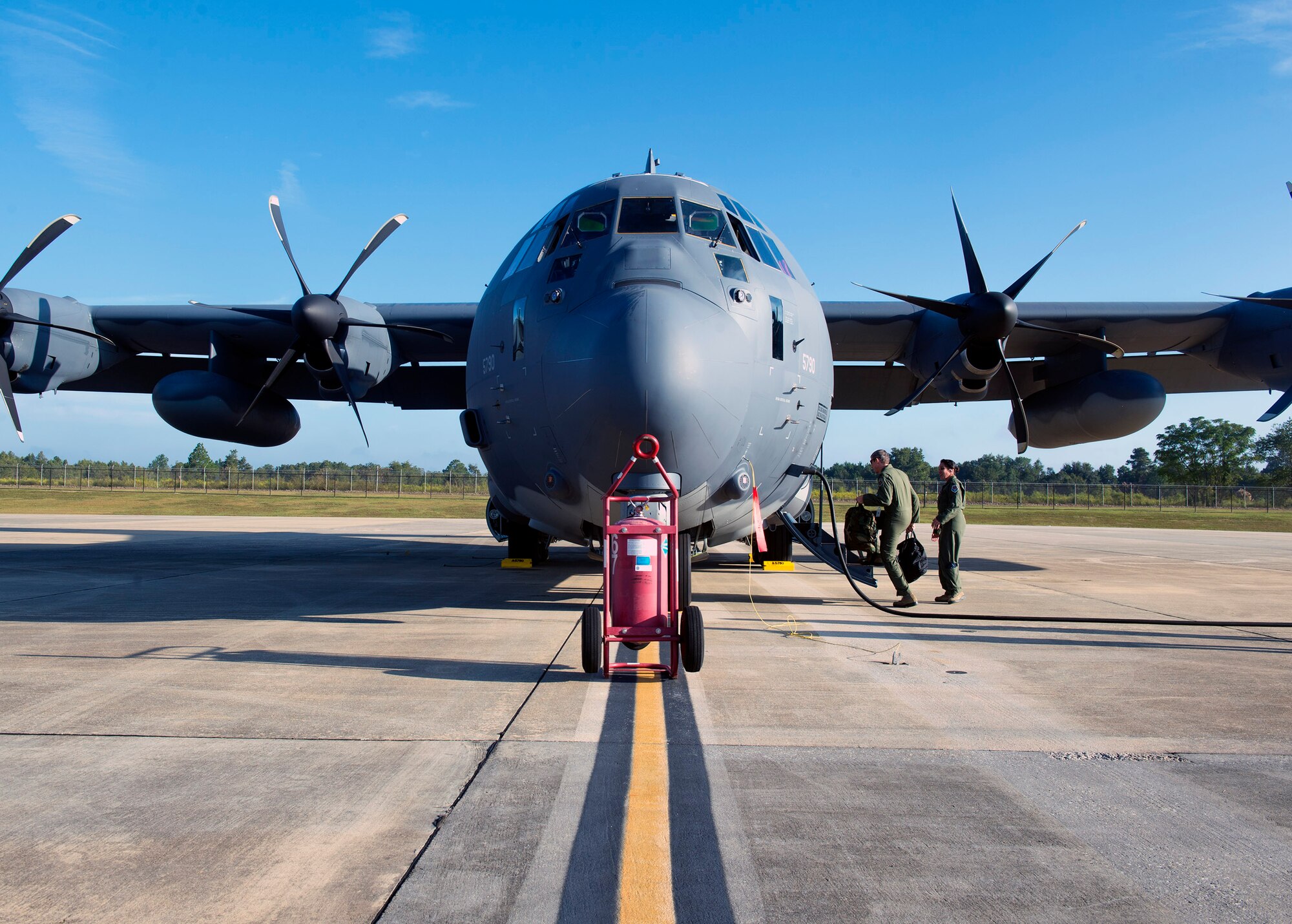 U.S. Air Force Col. Thomas Kunkel, 23d Wing commander, and U.S. Air Force Col. Yvette Guzman, 23d Aerospace Medicine Squadron commander, board an HC-130J Combat King II, Sept. 27, 2016, at Moody Air Force Base, Ga. Rescue pilots and aircrew members conducted the flight which consisted of low-level air drop scenarios during pilot proficiency training. (U.S. Air Force photo by Airman 1st Class Greg Nash)