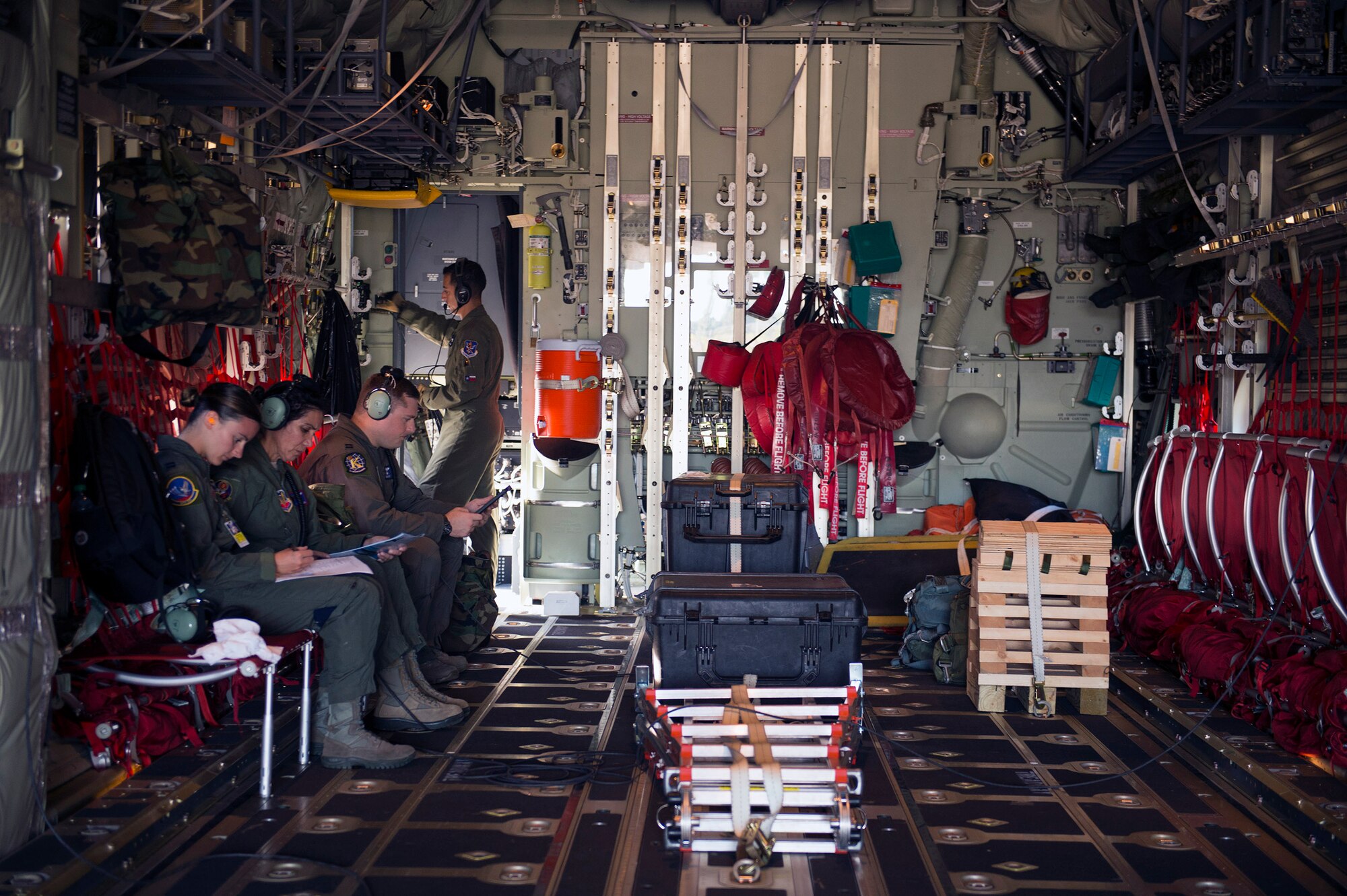 Airmen from the 347th Rescue Group and 23d Medical Group prepare to take off in an HC-130J Combat King II, Sept. 27, 2016, at Moody Air Force Base, Ga. The flight was part of pilot proficiency training, which refreshed 23d Wing and 347th Rescue Group pilots on low-level air drop techniques as well as take-off and landing procedures. (U.S. Air Force photo by Airman 1st Class Greg Nash)