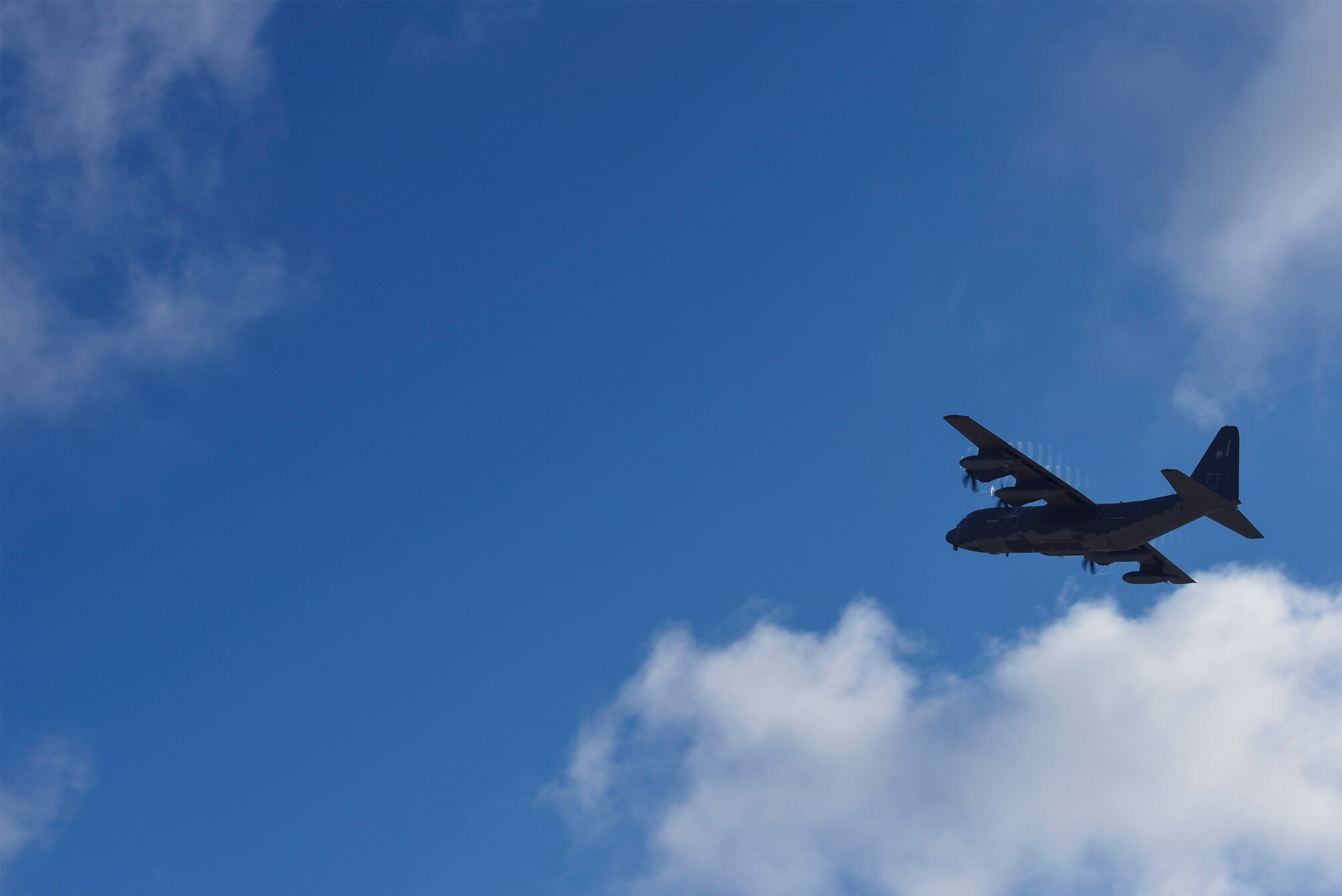 An HC-130J Combat King II ascends in the sky during pilot proficiency training, Sept. 27, 2016, at Moody Air Force Base, Ga. Eight Team Moody members from the 23d Wing, 347th Rescue Group and 23d Medical Group flew practicing standard and emergency procedures during flight. (U.S. Air Force photo by Airman 1st Class Greg Nash)