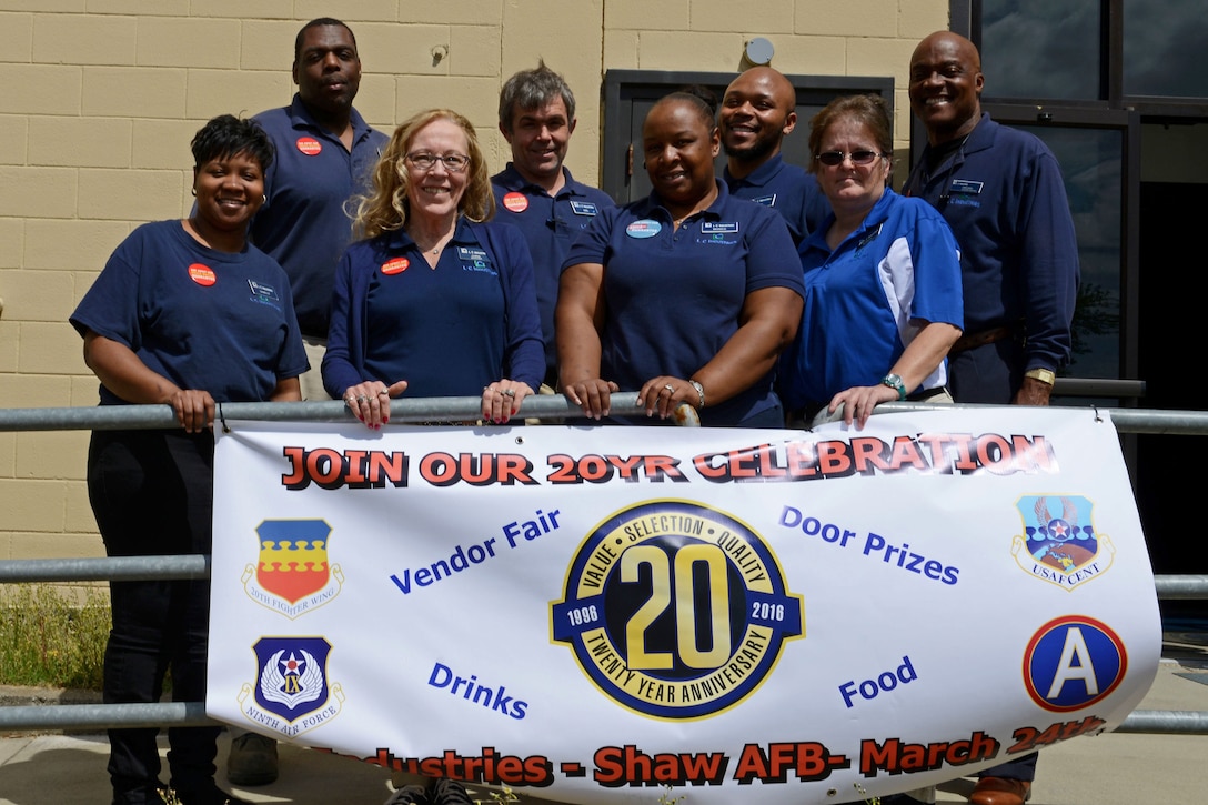 Base Supply Center employees celebrate 20 years of providing retail service at Shaw Air Force Base, S.C., March 24, 2016. The store supplies more than 5,000 products manufactured by the blind to the various units on base to assist them in completing their mission. Air Force photo by Airman 1st Class Destinee Dougherty