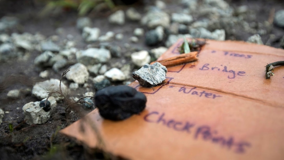 A terrain map legend is displayed during a field exercise aboard Marine Corps Outlying Field Camp Davis, N.C., Sept. 22, 2016. Support squadrons across the Marine Corps conduct these exercises to remain ready for any challenge they may face in forward deployed environments. This exercise featured training that included auxiliary airfield construction, ground security and airfield damage repair. The squadron's capabilities contribute to 2nd Marine Aircraft Wing's role in the Marine Air Ground Task Force's mission accomplishment. The Marines participating in the exercise are assigned to Marine Wing Support Squadron 274, Marine Aircraft Group 29, 2nd MAW. 