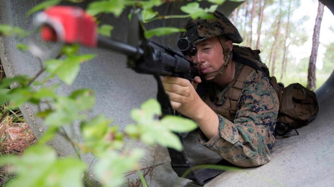 Lance Cpl. Bryan Naylor provides security during a field exercise at Marine Corps Outlying Field Camp Davis, N.C., Sept. 22, 2016. Support squadrons across the Marine Corps conduct these exercises to remain ready for any challenge they may face in forward deployed environments. This exercise featured training that included auxiliary airfield construction, ground security and airfield damage repair. The squadron's capabilities contribute to 2nd Marine Aircraft Wing's role in the Marine Air Ground Task Force's mission accomplishment. Naylor is a tactical switching operator assigned to Marine Wing Support Squadron 274, Marine Aircraft Group 29, 2nd MAW. 