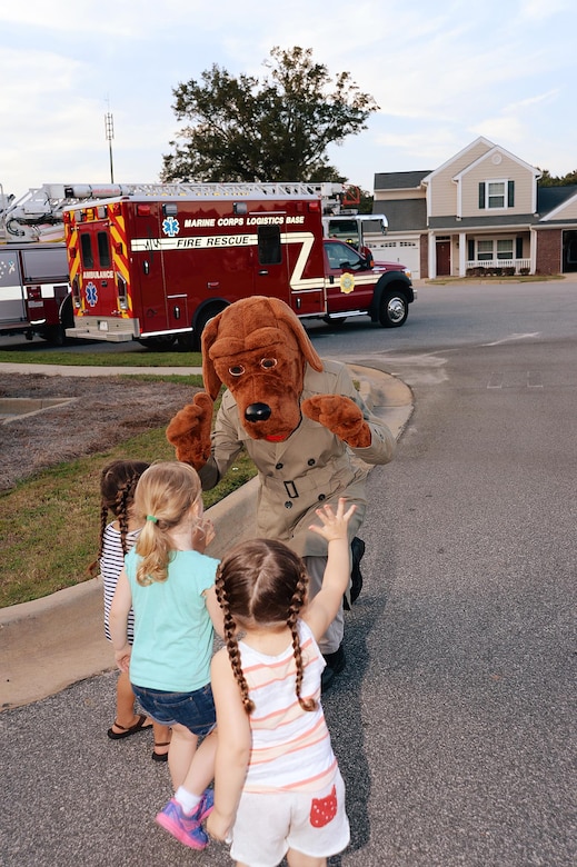 Agencies from the Installation and those that support the Installation hosted a Preparedness Fair for families and employees of MCLB Albany. McGruff the Crime Dog (pictured) was out in force with the Marine Corps Police Dept. Photo by Nathan Hanks, MCLB Albany PAO