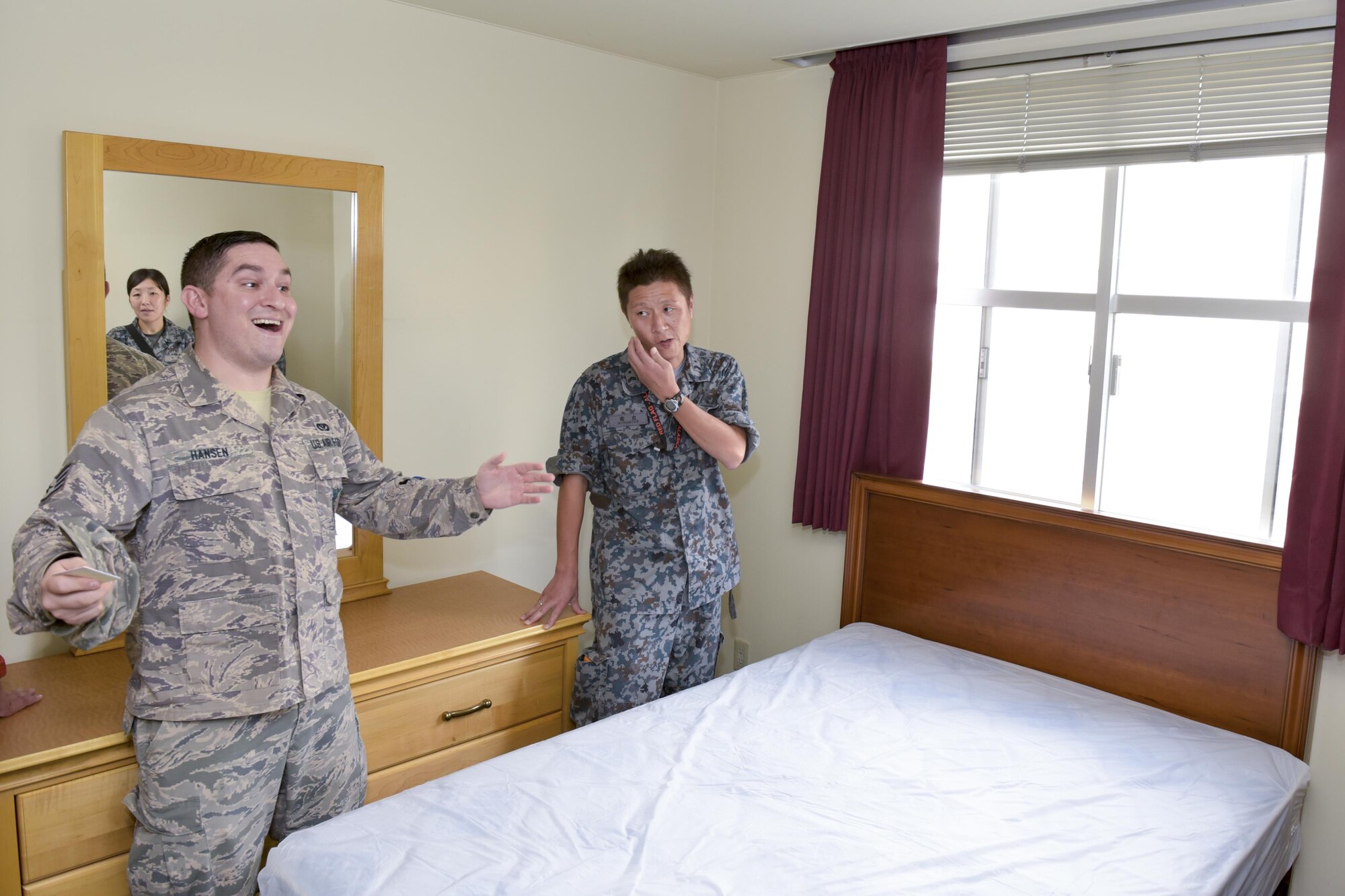 U.S. Air Force Staff Sgt. Stephen Hansen, 374th Civil Engineer Squadron airman dormitories leader, gives a brief during the Bilateral Exchange Program at Yokota Air Base, Japan, Sept. 26. 2016. The program is designed to strengthen the US-Japan partnership and expand interoperability between the U.S. Air Force and JASDF through hands-on experience. (U.S. Air Force photo by Machiko Imai/Released)