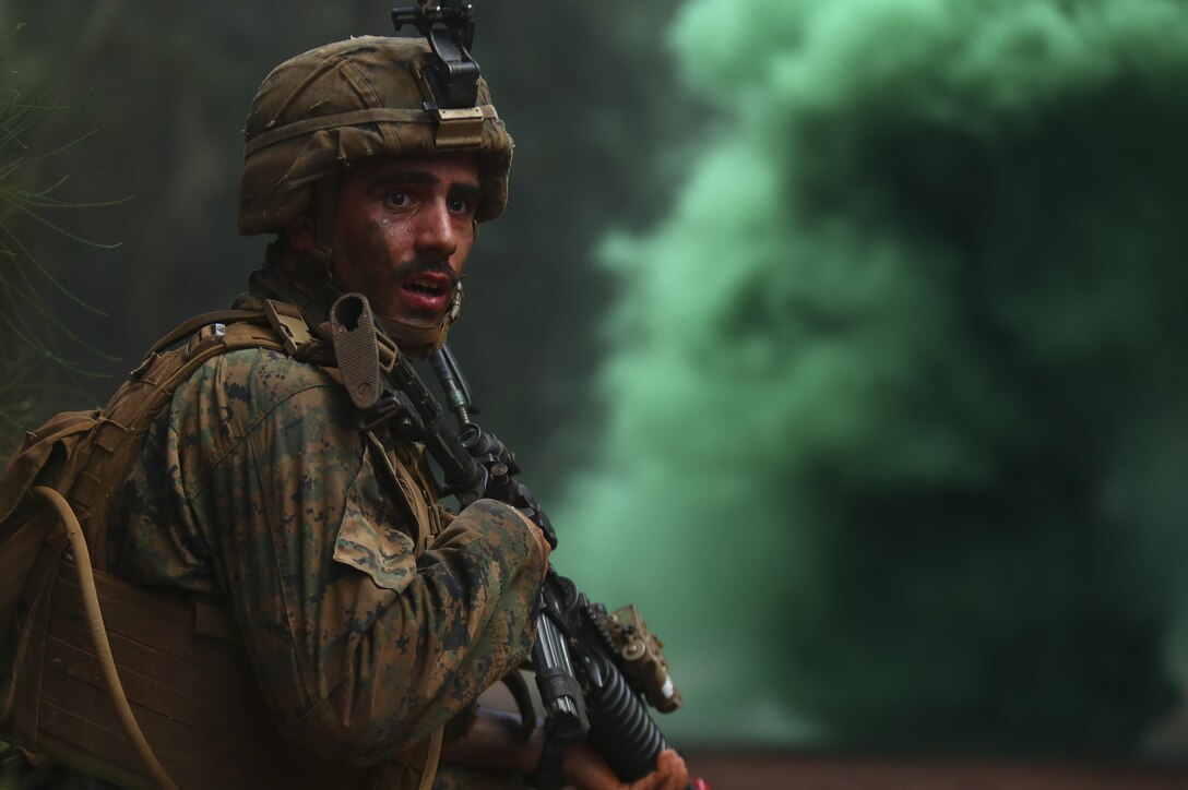 U.S. Marine Corps Lance Cpl. Daniel Wagenblast, rifleman with Bravo Company, 1st Battalion, 3rd Marine Regiment, participates in a casualty evacuation scenario during the Advanced Infantry Course (AIC) aboard Kahuku Training Area, Sept. 20, 2016. AIC is intermediate training designed to enhance and test the Marine's skills and leadership abilities as squad leaders in a rifle platoon. (U.S. Marine Corps Photo by Cpl. Aaron S. Patterson)
