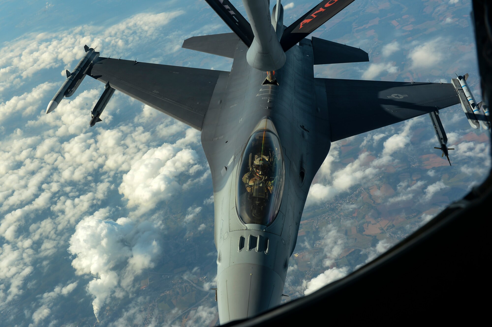 A U.S. Air Force KC-135 Stratotanker, assigned to the 191st Air Refueling Squadron from Roland R. Wright Air National Guard Base, Utah, refuels an F-16 Fighting Falcon assigned to the 52nd Fighter Wing, Spangdahlem Air Base, Germany, Sept. 27, 2016. The Utah ANG unit conducted the routine in-flight refueling to garner experience working with F-16s. (U.S. Air Force photo/Senior Airman Dawn M. Weber)