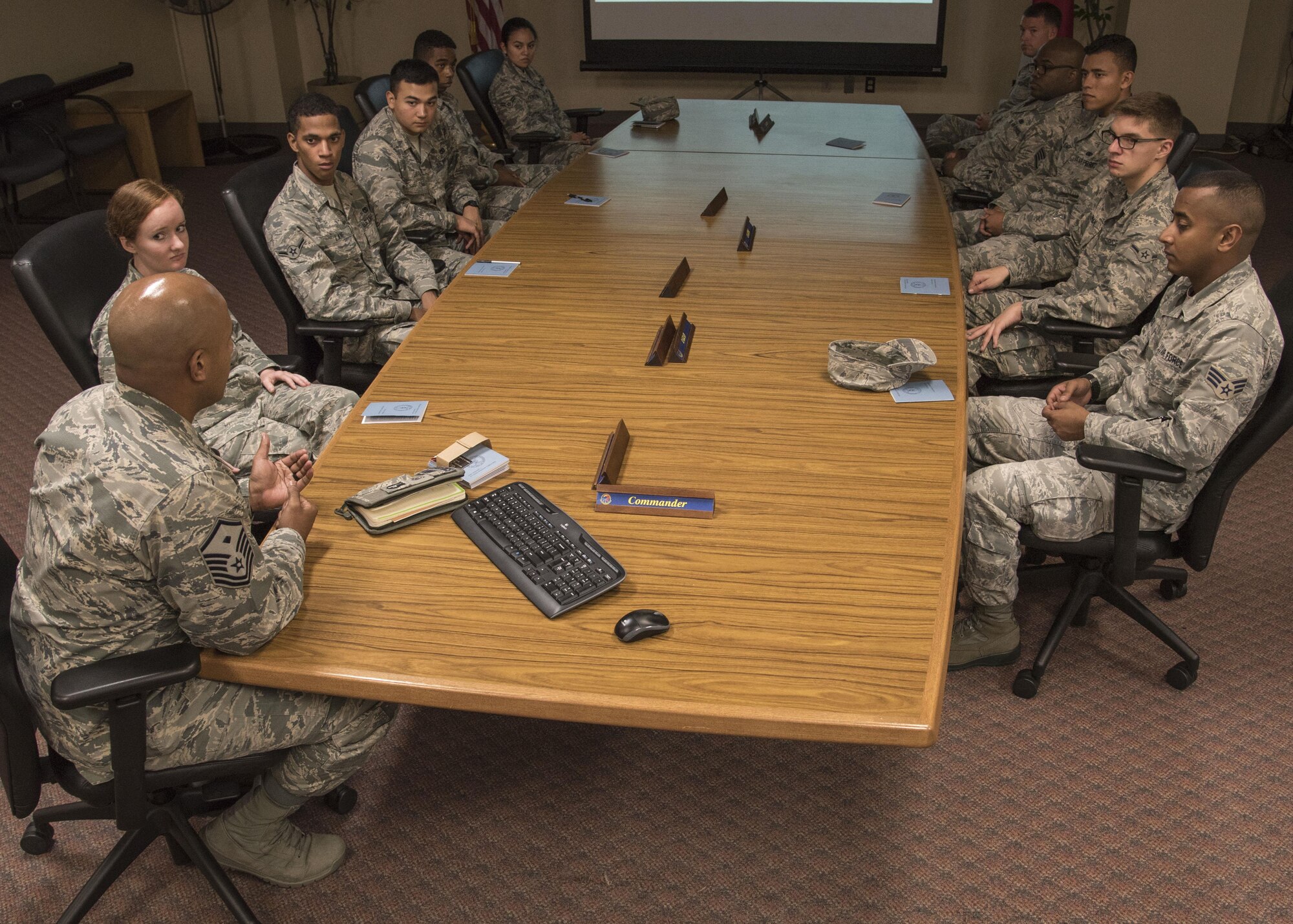 U.S. Air Force Master Sgt. Jose Ramon, the 35th Logistics Readiness Squadron first sergeant, speaks with Airmen during a newcomer's brief at Misawa Air Base, Japan, Sept. 19, 2016. During the brief, Ramon discussed with Airmen his expectations as their shirt and informed them about resoures the first sergeants offer. (U.S. Air Force photo by Airman 1st Class Sadie Colbert)