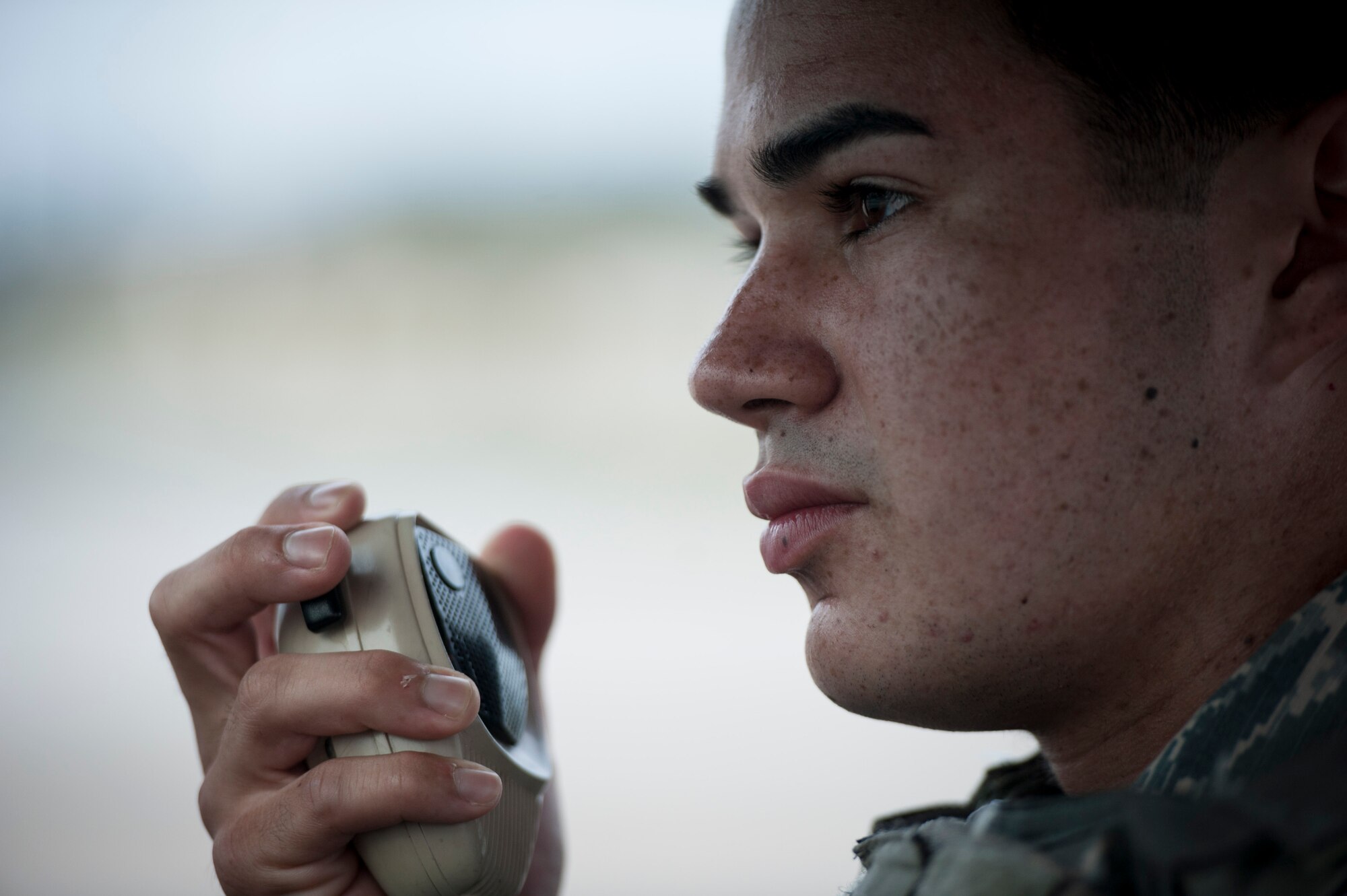 U.S. Air Force Airman 1st Class Matthew Knighten, 18th Security Forces Squadron response force member, monitors radio chatter on the flightline Sept. 27, 2016, at Kadena Air Base, Japan. Knighten bears the responsibility for providing security for assets on the flightline and to prevent any unauthorized activity from affecting Kadena’s aircraft operations.  (U.S. Air Force photo by Senior Airman Peter Reft)