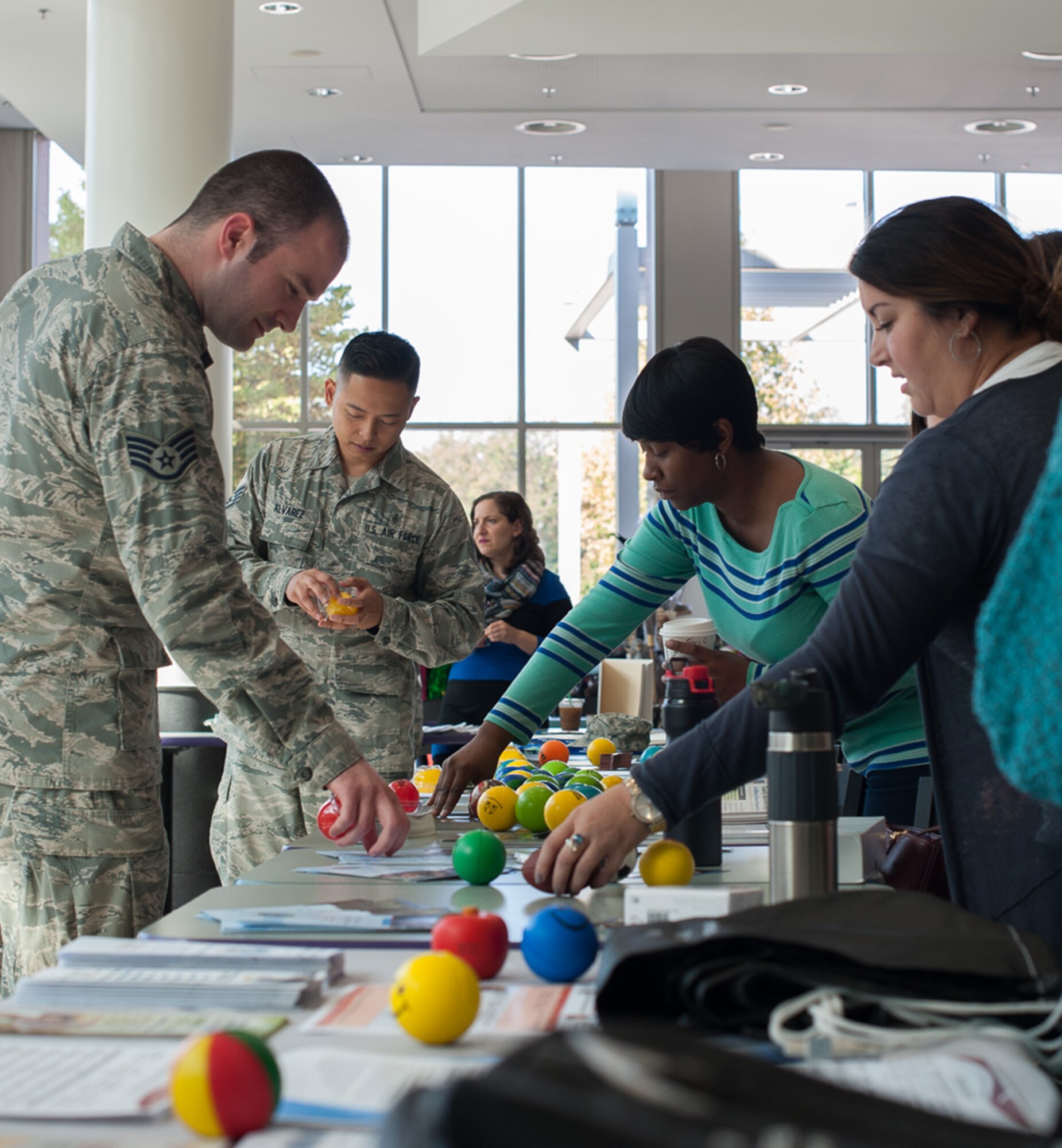 Airmen from the 86th Medical Group assist Airmen at a suicide prevention fair Sept. 22, 2016, at Ramstein Air Base, Germany. Decision-making, stress management, and relocation adjustment were among several programs featured.